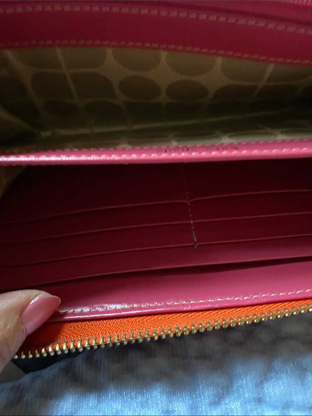 kate spade orange  Leather Zip Around Wallet with Gold Logo with pink inside